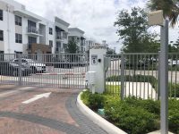 Apartment gate entry with anti piggy back barrier and RFID reader for residents